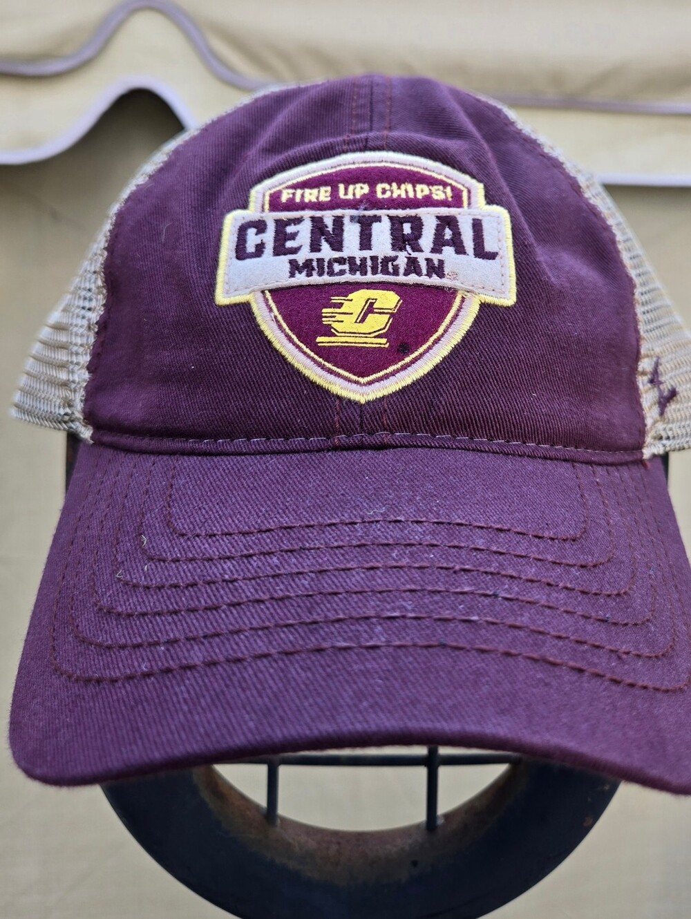 Maroon Zephyr trucker hat has a cotton front and tan mesh back. This adjustable